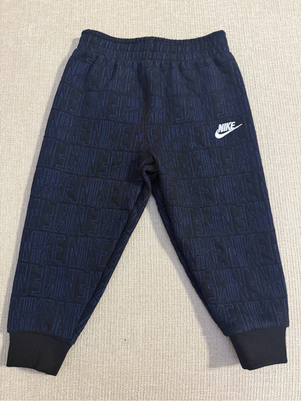 Nike Kids Navy Jogger Pants with White Swoosh